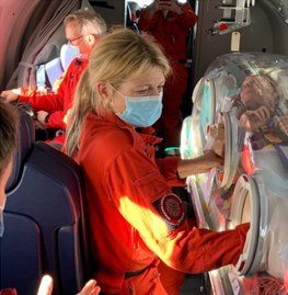 Flight nurse working at an EpiShuttle in the cabin
